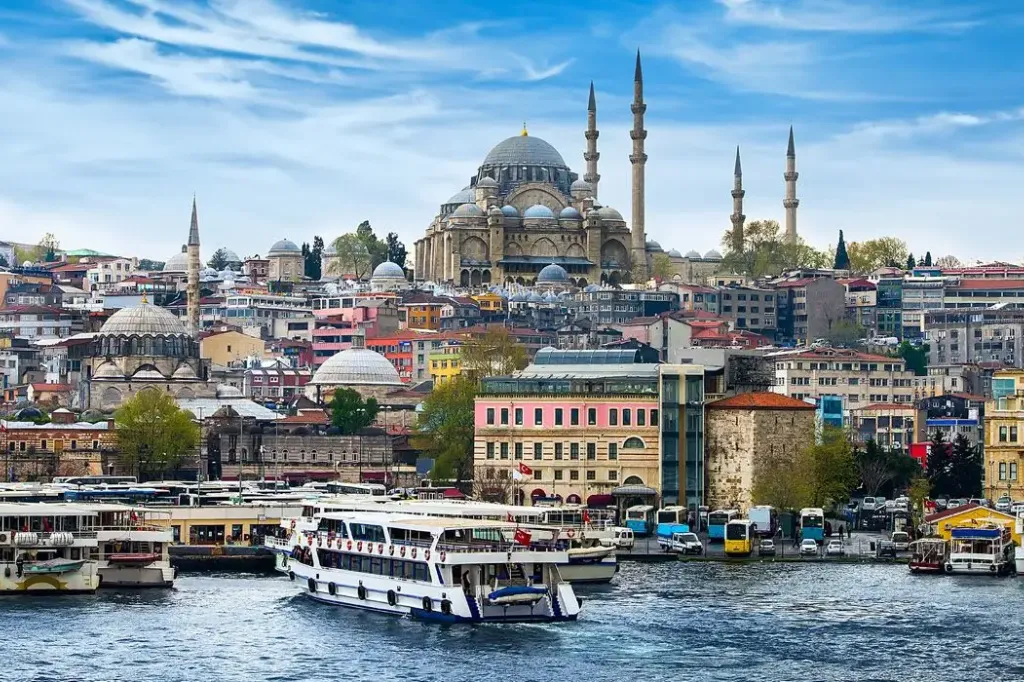 europa-1 white fox sitting on snow during daytime