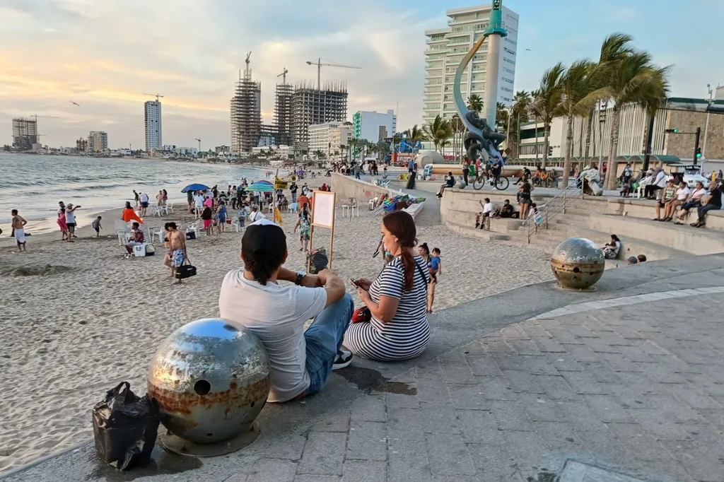 maza-7 brown squirrel eating nuts